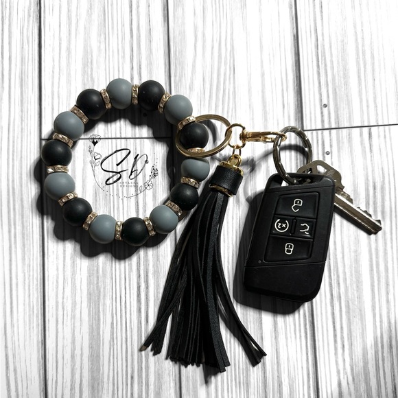 7” Stretchy Black and Grey Silicone Wristlet with Tassel - Picture 3 of 5